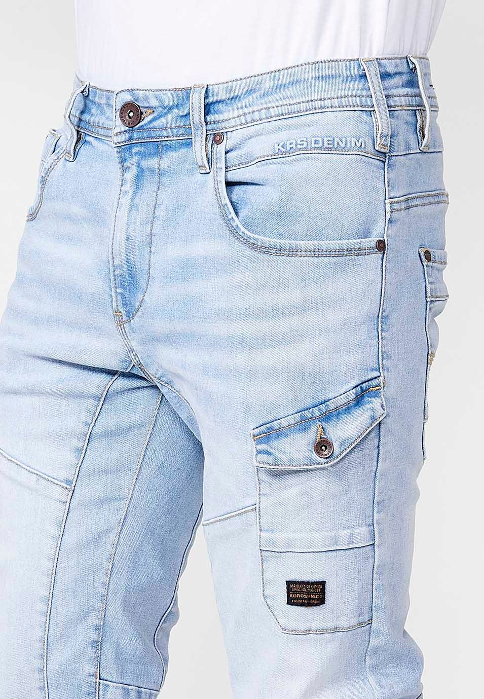 Pantalon de travail long en denim coupe classique avec cinq poches, une poche avec bouton et découpes aux genoux en Bleu pour Homme