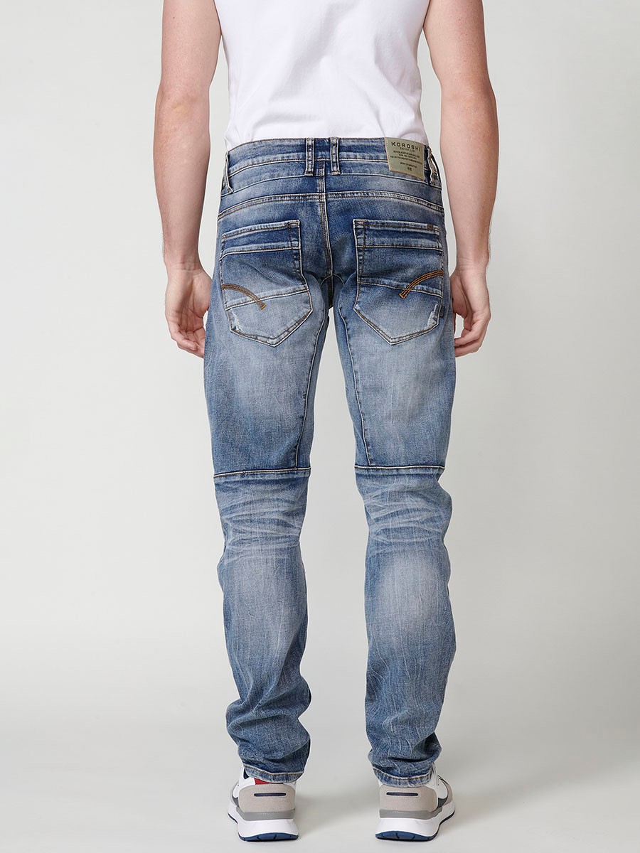 Jean cargo long coupe régulière style denim extensible avec effet délavé usé et coupes et poches sur la jambe avec fermeture zippée et boutonnée sur le devant en bleu pour homme