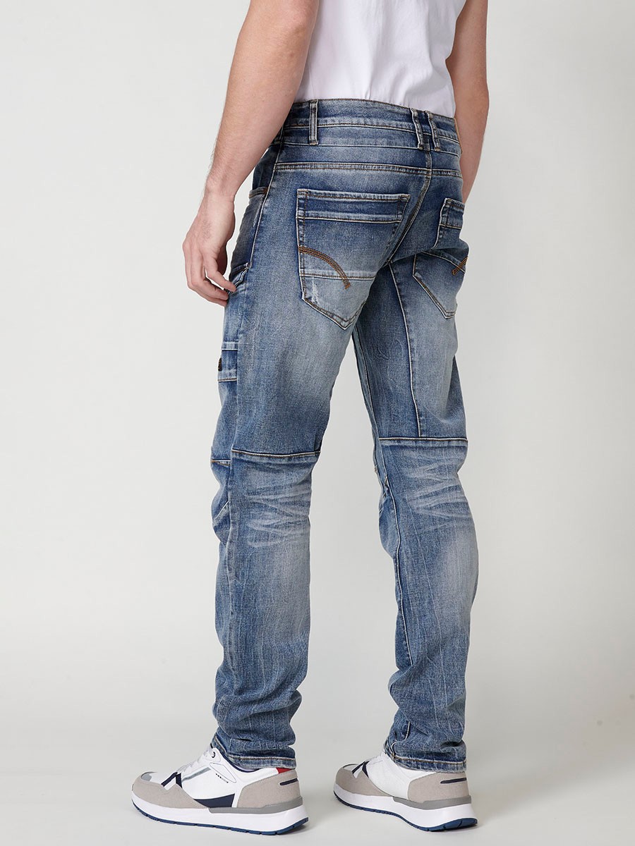 Jean cargo long coupe régulière style denim extensible avec effet délavé usé et coupes et poches sur la jambe avec fermeture zippée et boutonnée sur le devant en bleu pour homme