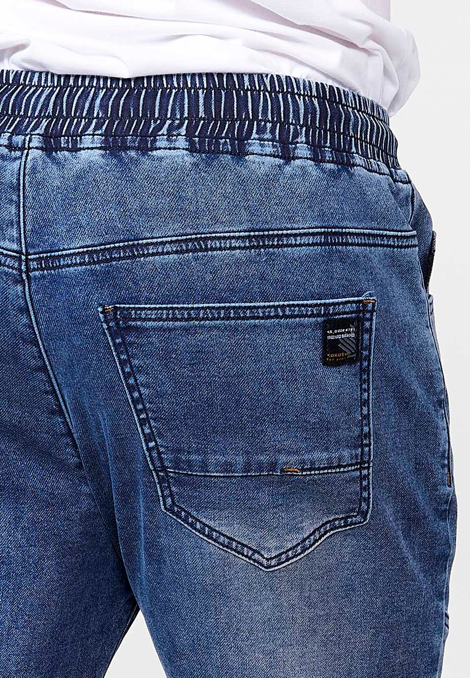 Pantalón jogger denim con Cintura con goma elástica y Cinco bolsillos con uno cerillero con Detalles en las rodillas color Azul para Hombre 4