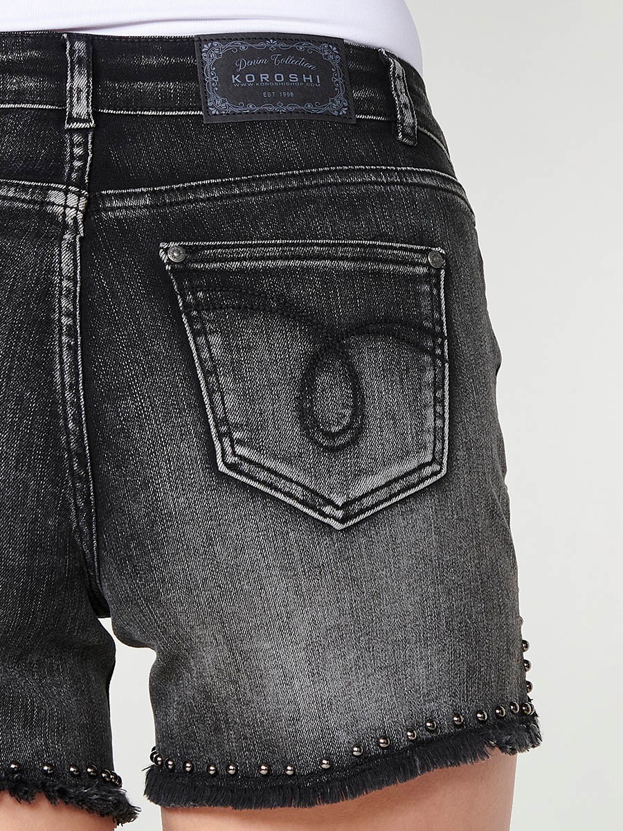 Short Texà Elàstic amb Tacs, Baix Esfilagarsat i Obertura Lateral en Denim Negre 9