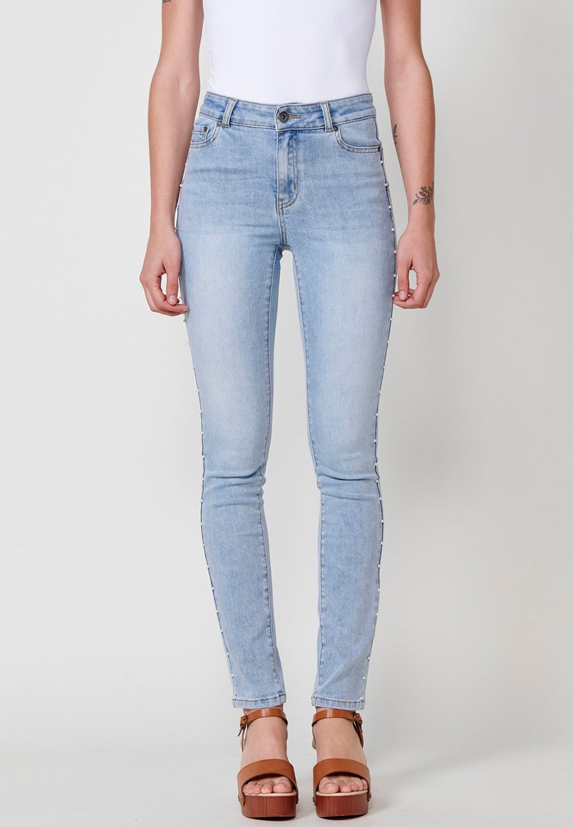 Slim fit jeans with pearl details on the sides in blue for women 6