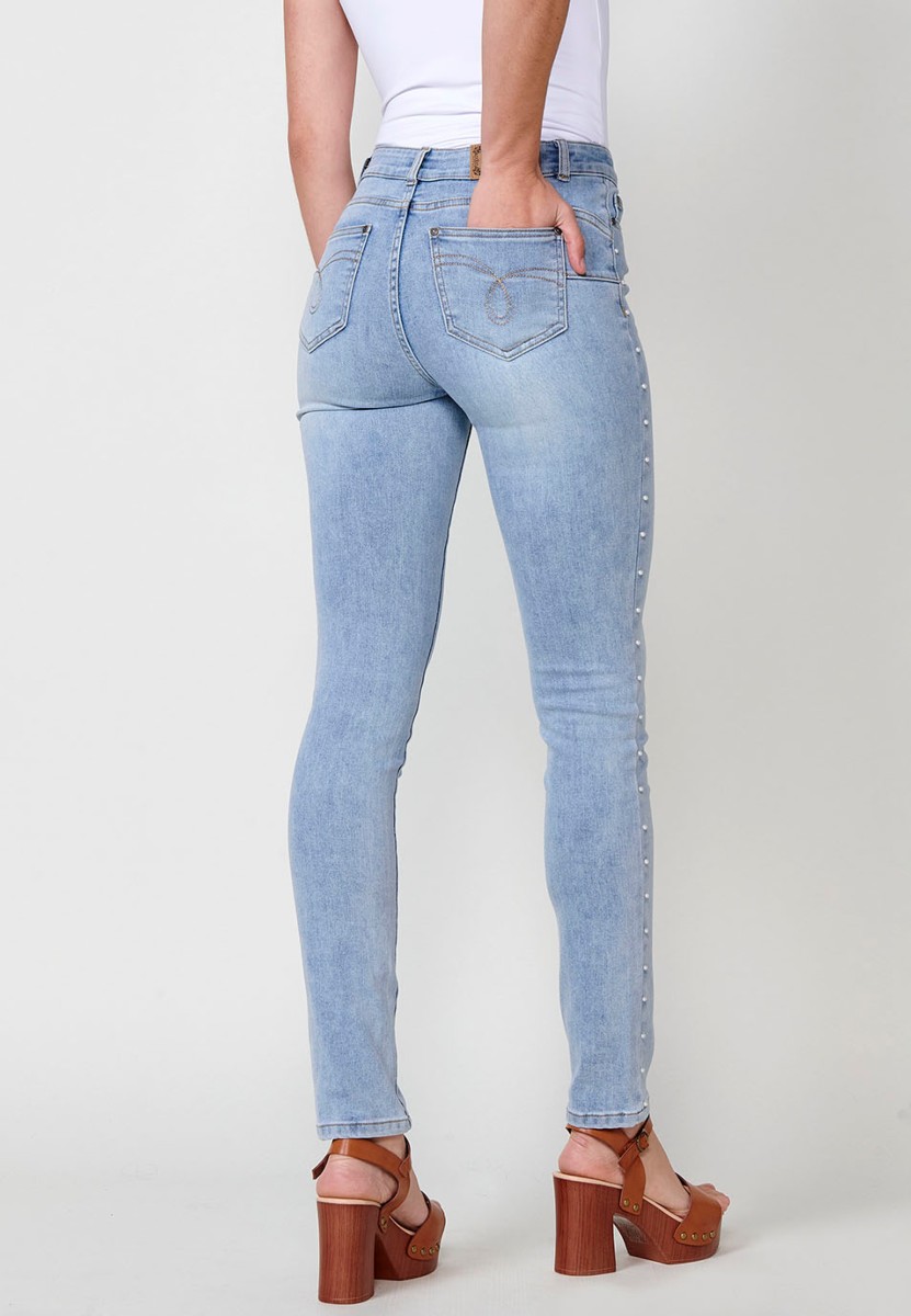 Slim fit jeans with pearl details on the sides in blue for women 2