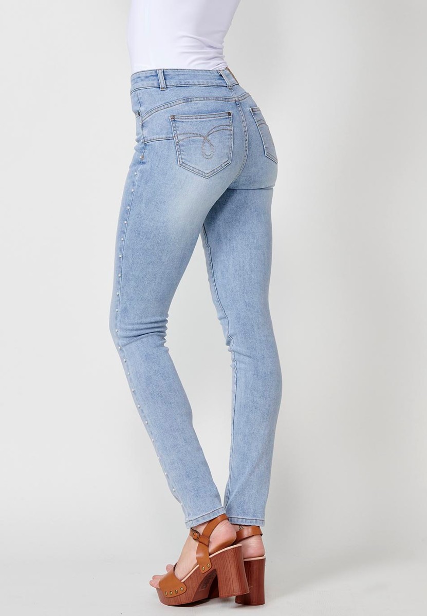 Slim fit jeans with pearl details on the sides in blue for women 4