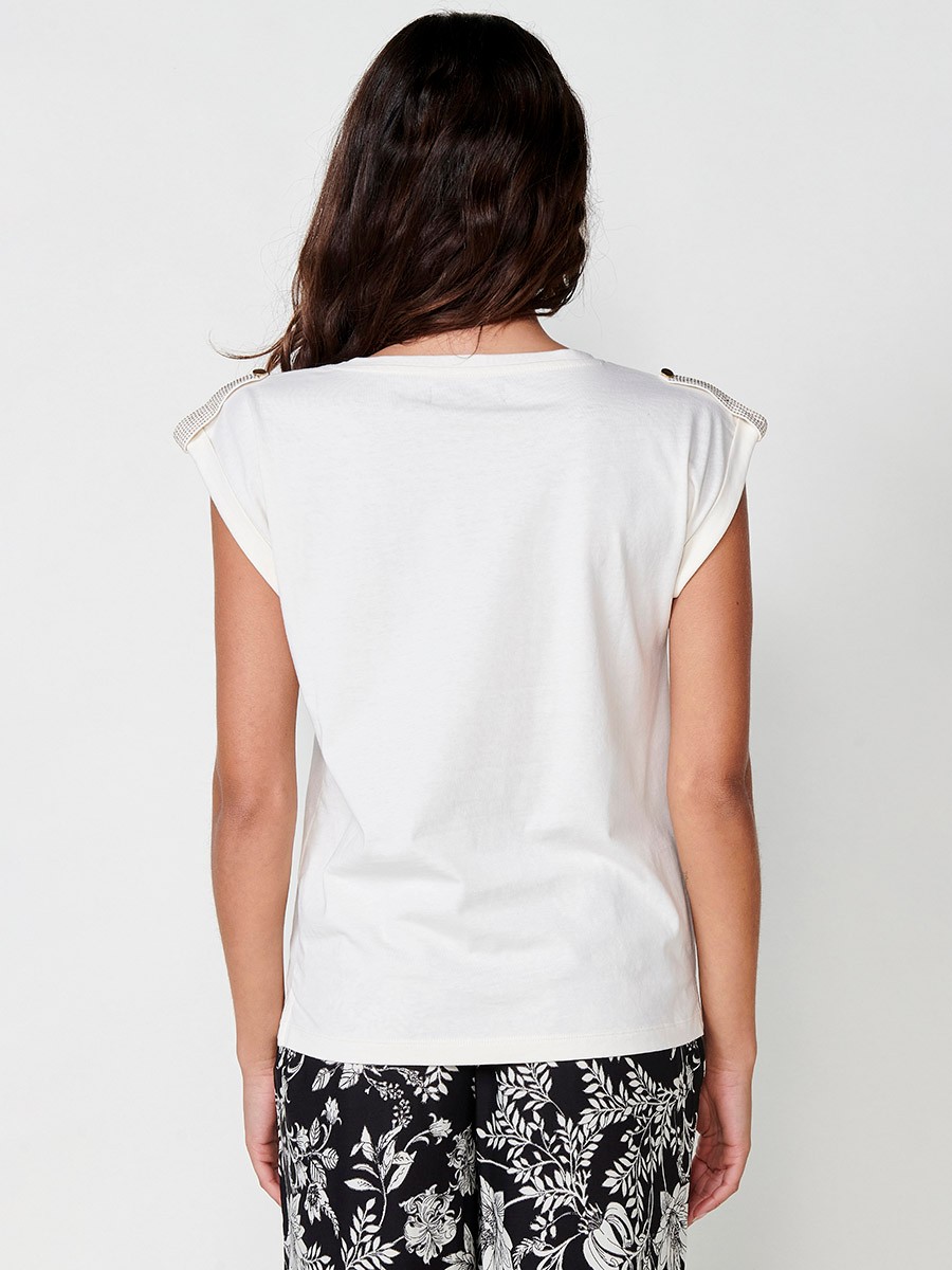 Short-sleeved round-neck T-shirt with a front pocket and a glitter detail on the flap and a button on the sleeve hem and side slits with a Koröshi metal logo plaque on the front for women in ecru